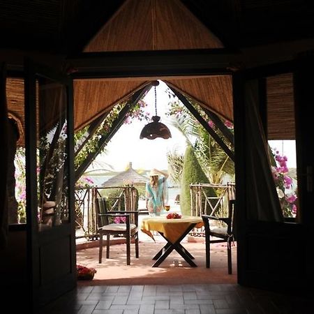 Lodge Du Delta Niominka Dinouar Bilik gambar